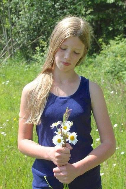 Daisy flowers representing scholarship growth and opportunity